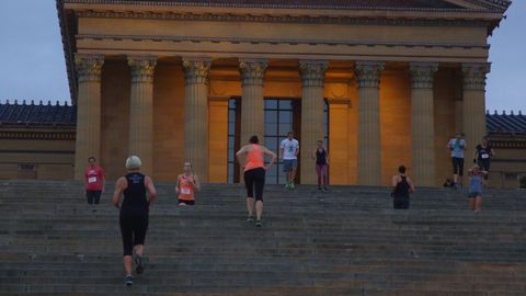 Runners climbing the steps of the Philadelphia Museum of Art