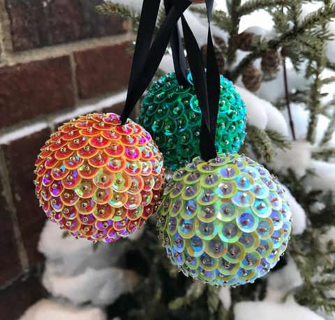 sequin ornaments in orange, pink, green, and blue