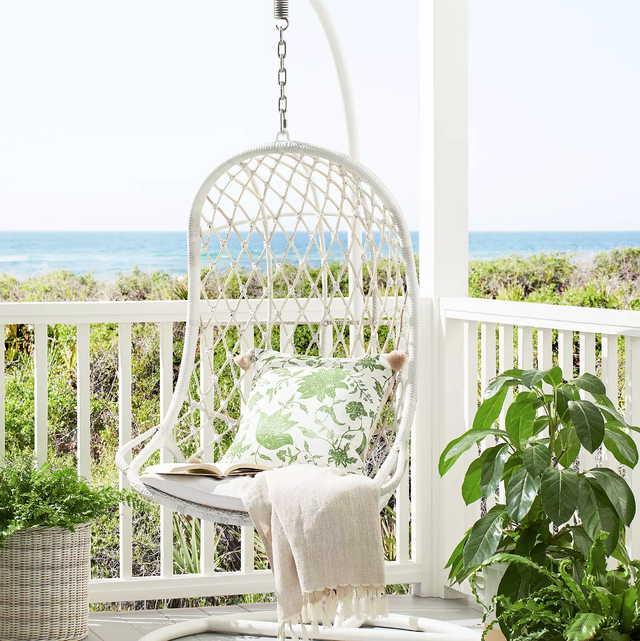 a white chair on a porch