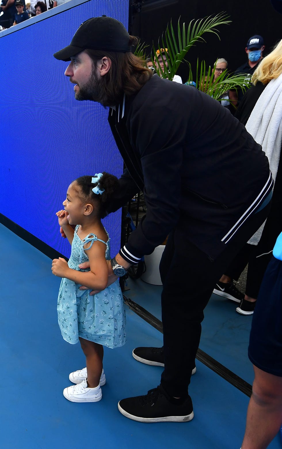 Serena Williams' toddler daughter and husband Alexis Ohanian at the Day at  the Drive tennis event