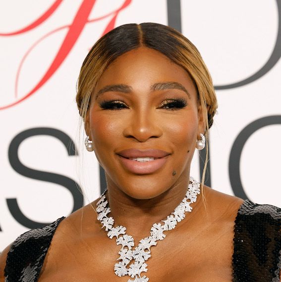 serena williams smiling on a red carpet
