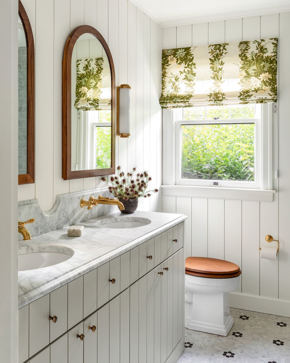 serene powder bath with creamy white vanity and vgroove walls