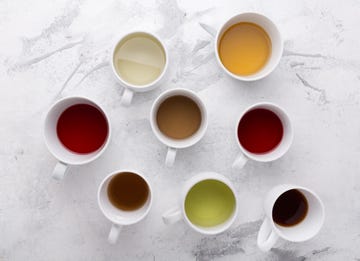 set of cups with tea different types of tea