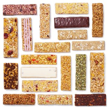 are protein bars actually healthy? a selection of protein and cereal bars displayed on a plain white background