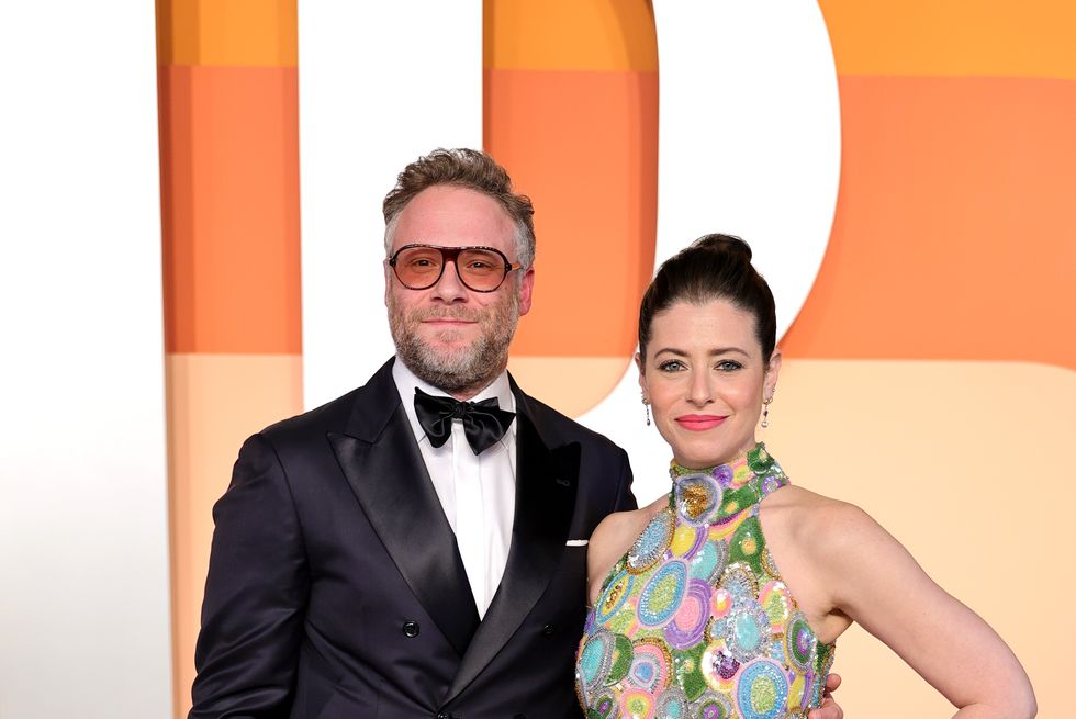 seth rogen poses with lauren miller