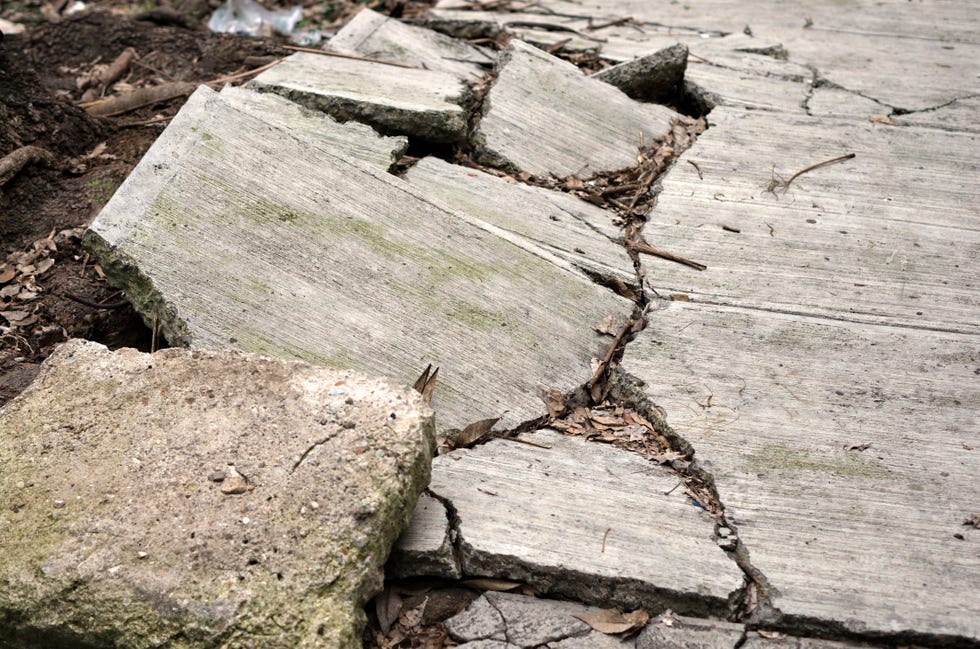 earthquake turkey syria questions with an expert severely cracked and lifted concrete footpath