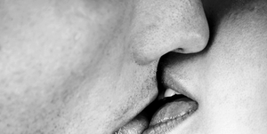 closeup image of couple kissing