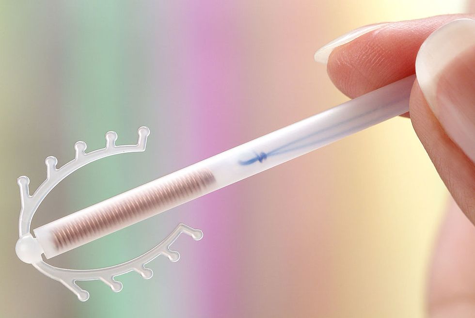 iud, birth control device photo by bsipuniversal images group via getty images