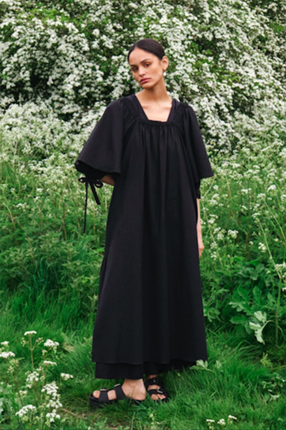 a person in a black dress a person in a black dress