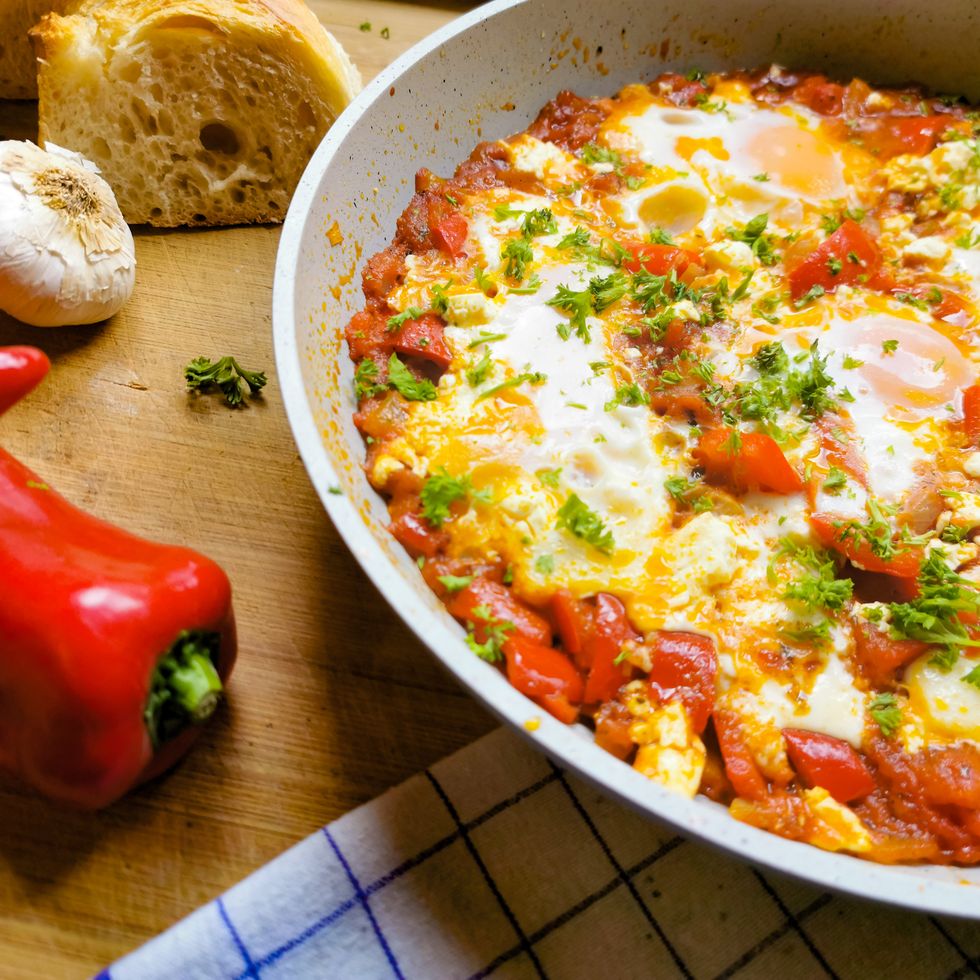 shakshuka with bread and cheese and eggs