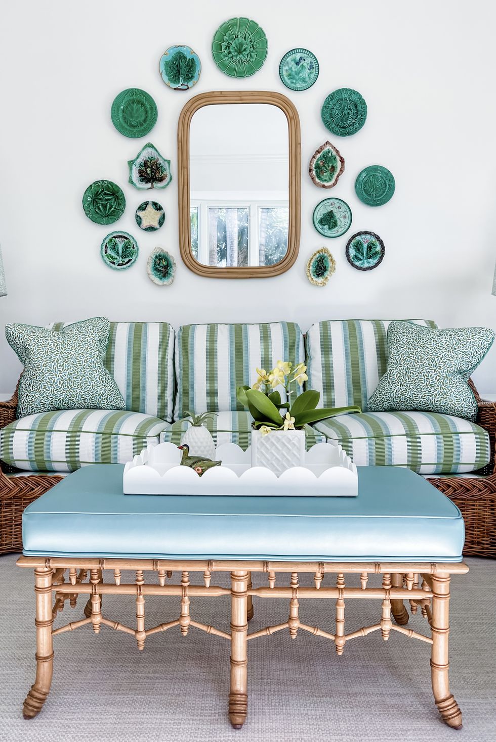 green and blue living room with wicker furniture