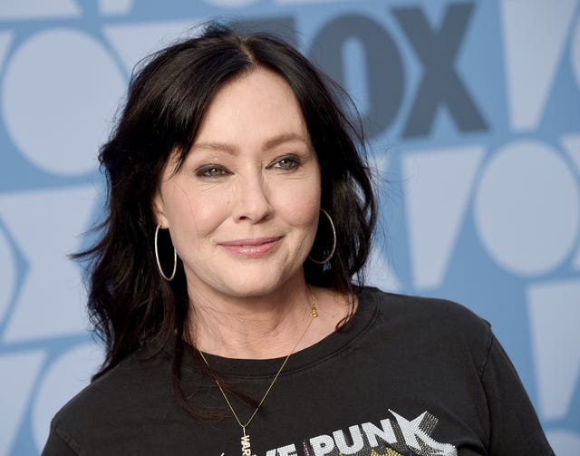 shannen doherty smiling for a photo during arrivals for a fox event