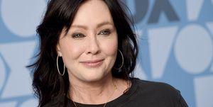 shannen doherty smiling for a photo during arrivals for a fox event