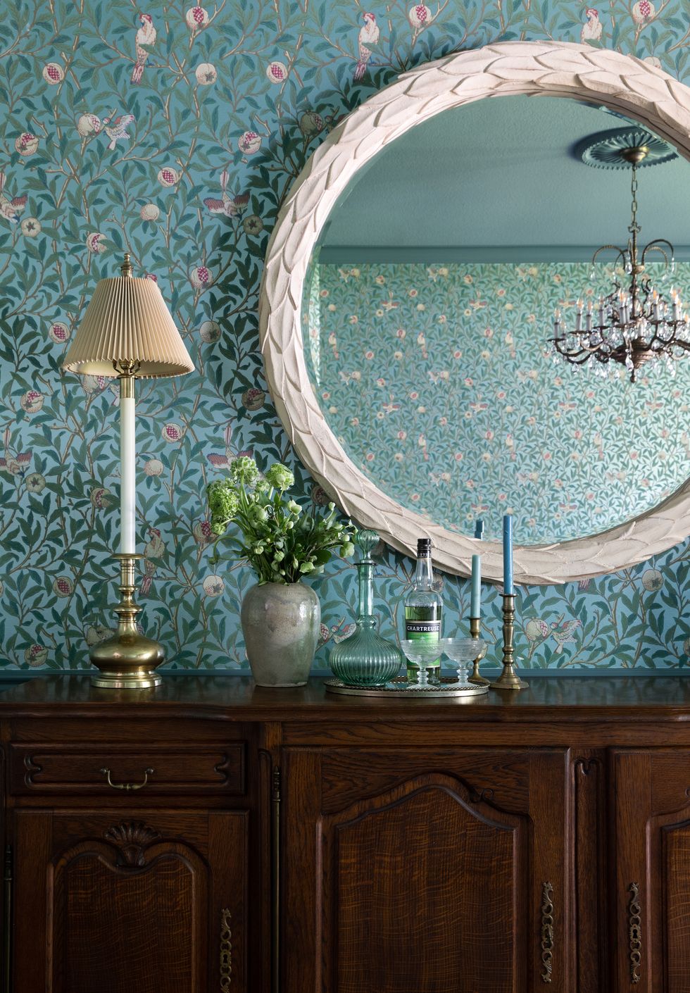 dining room with botanical wallpaper