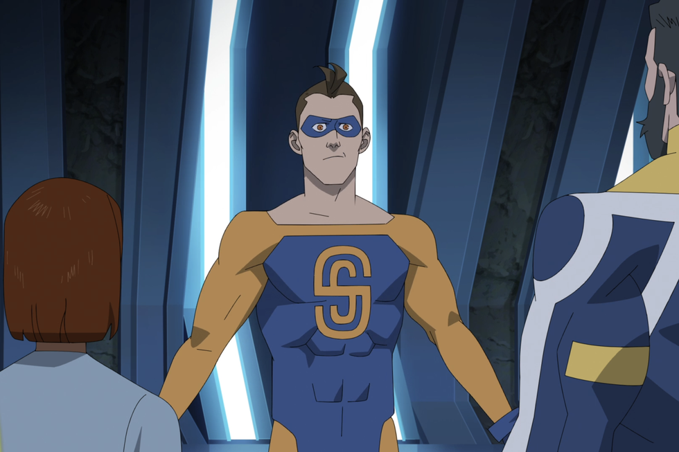 shapesmith in invincible, wearing his orange and blue spandex outfit