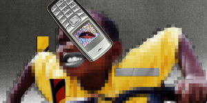a cell phone on a colorful blanket