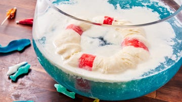 blue punch with an ice cream lifeboat and gummy sharks