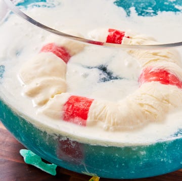 Shark Punch blue punch with an ice cream lifeboat and gummy sharks