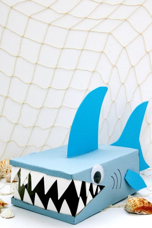 crafted shark model with fins and sharp teeth