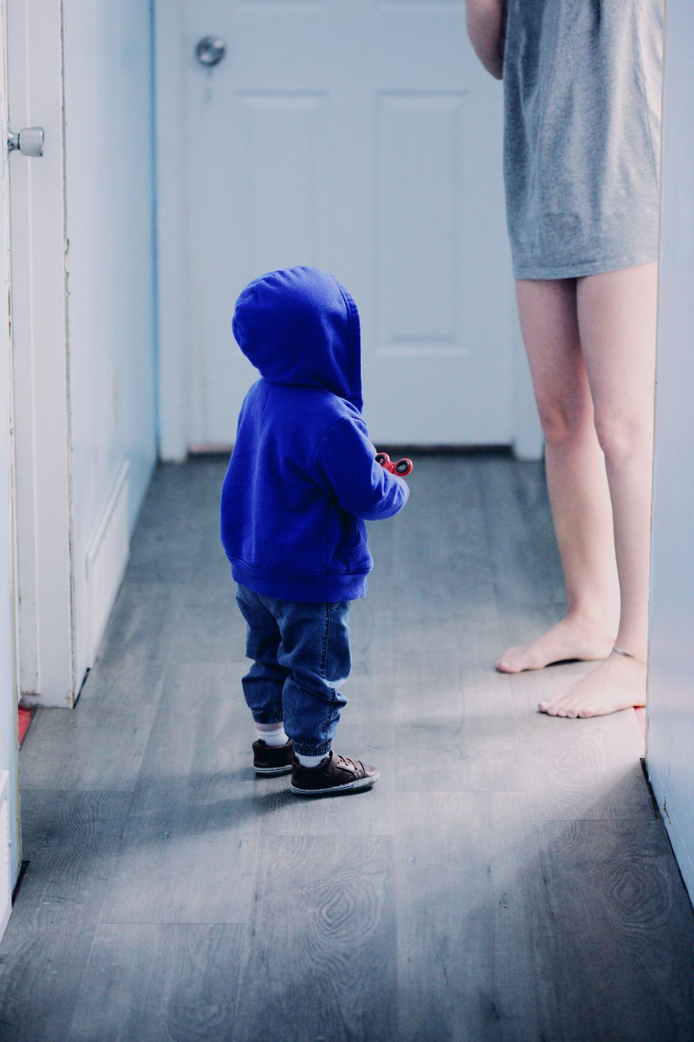 Blue, Child, Standing, Toddler, Snapshot, Human, Floor, Leg, Flooring, Electric blue, 
