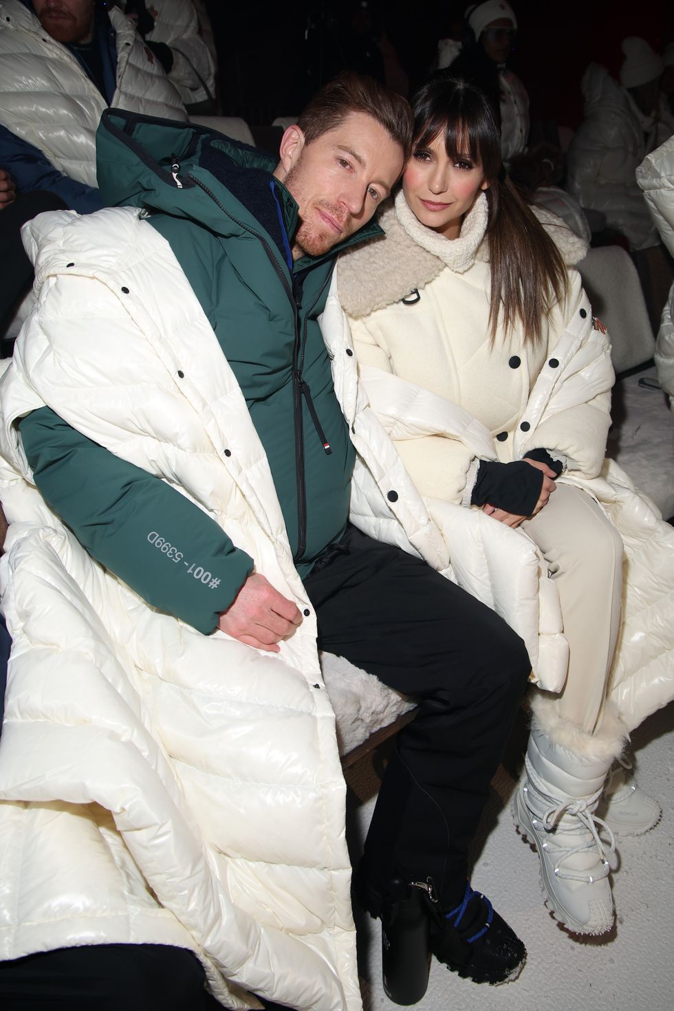 shaun white and nina dobrev sitting in the front row﻿ of moncler grenoble fall winter 2024
