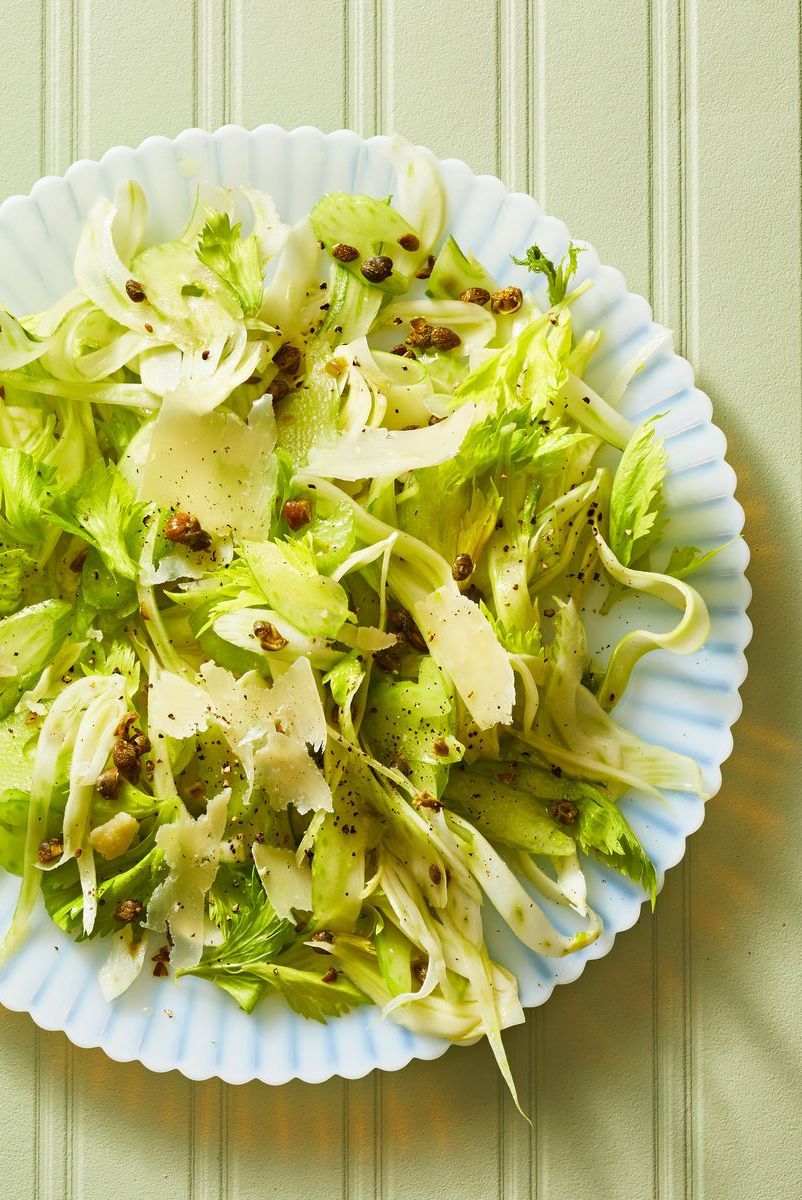 shaved fennel and celery salad on a blue plate