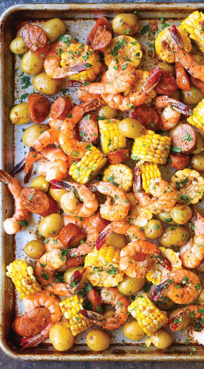 https://hips.hearstapps.com/hmg-prod/images/sheet-pan-dinners-shrimp-boil-1578081161.jpg