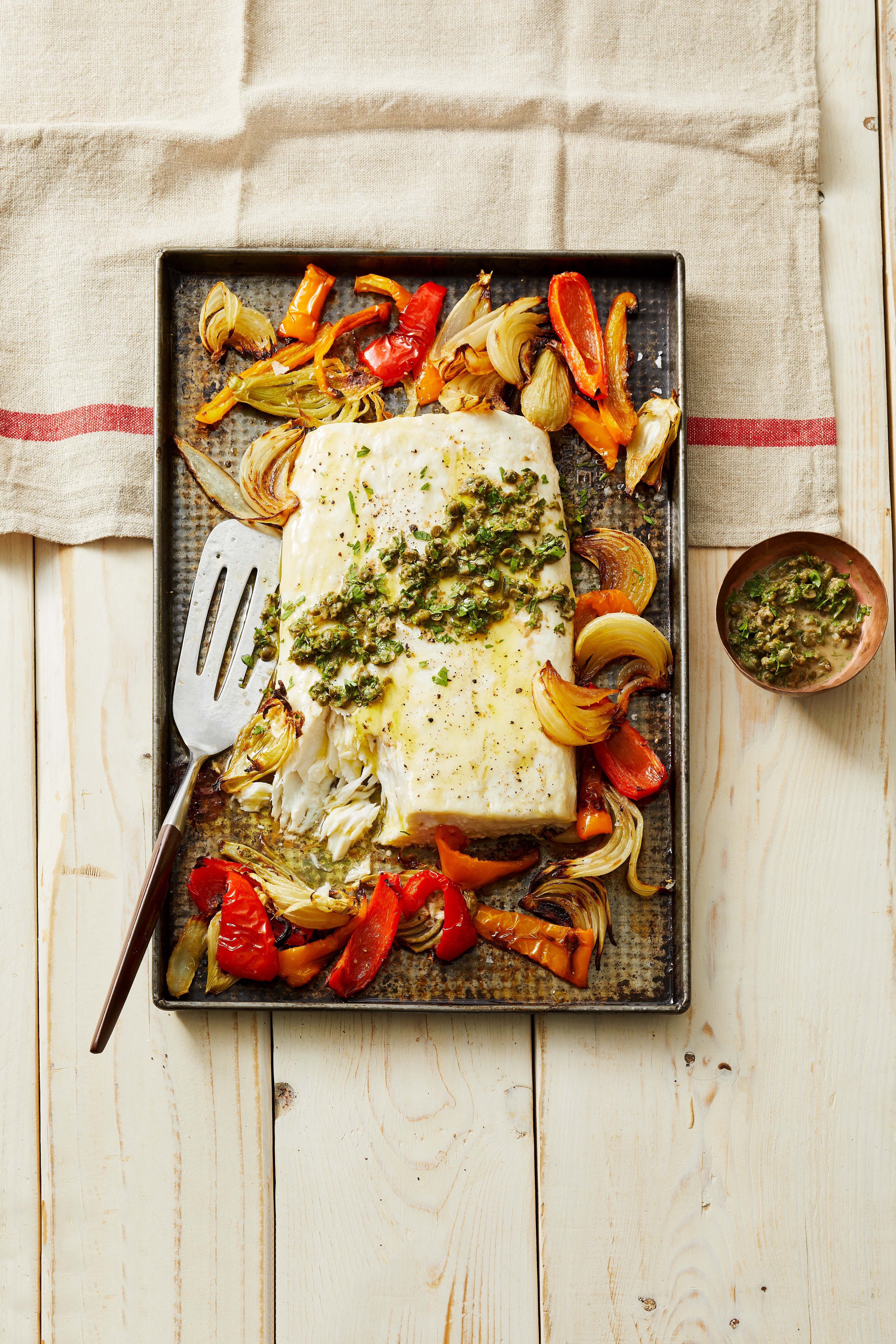 https://hips.hearstapps.com/hmg-prod/images/sheet-pan-fish-and-vegetables-654512cea0a71.jpg