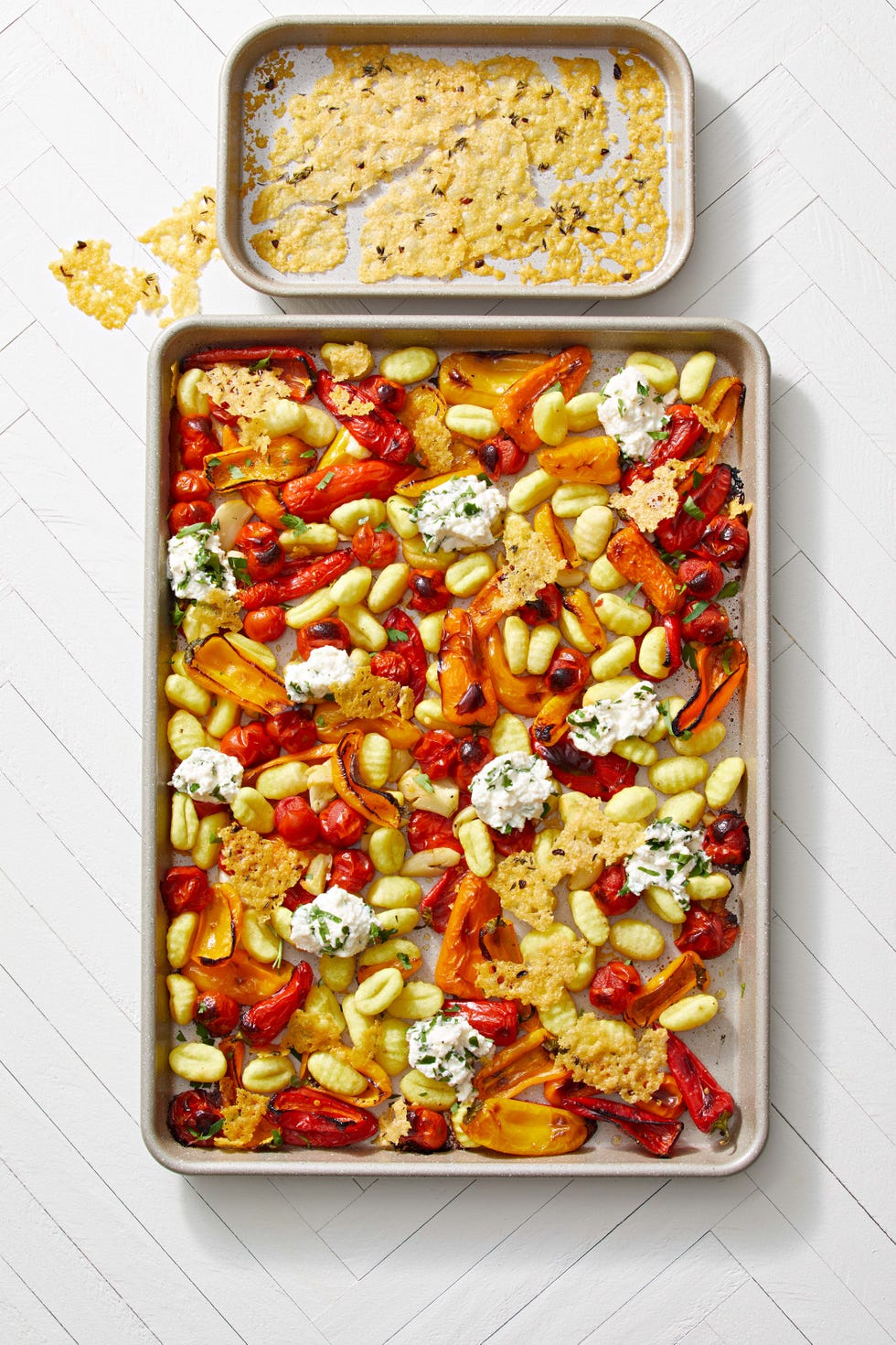 sheet pan gnocchi and peppers with thyme on a sheet pan