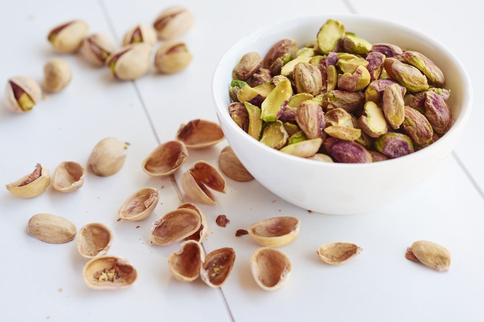 shelled pistachio nuts in a small bowl