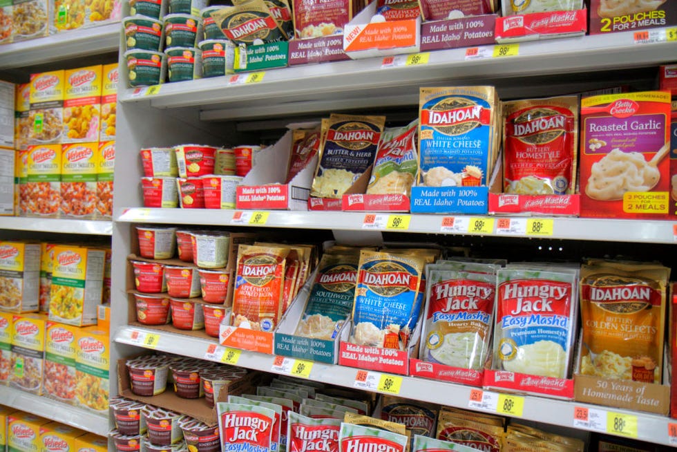Shelves of instant mashed potatoes packets at Walmart.