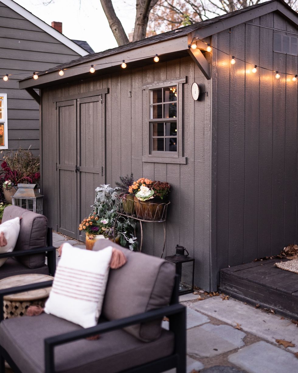 an outdoor area painted with sherwin williams's 2021 color of the year ﻿urbane bronze
