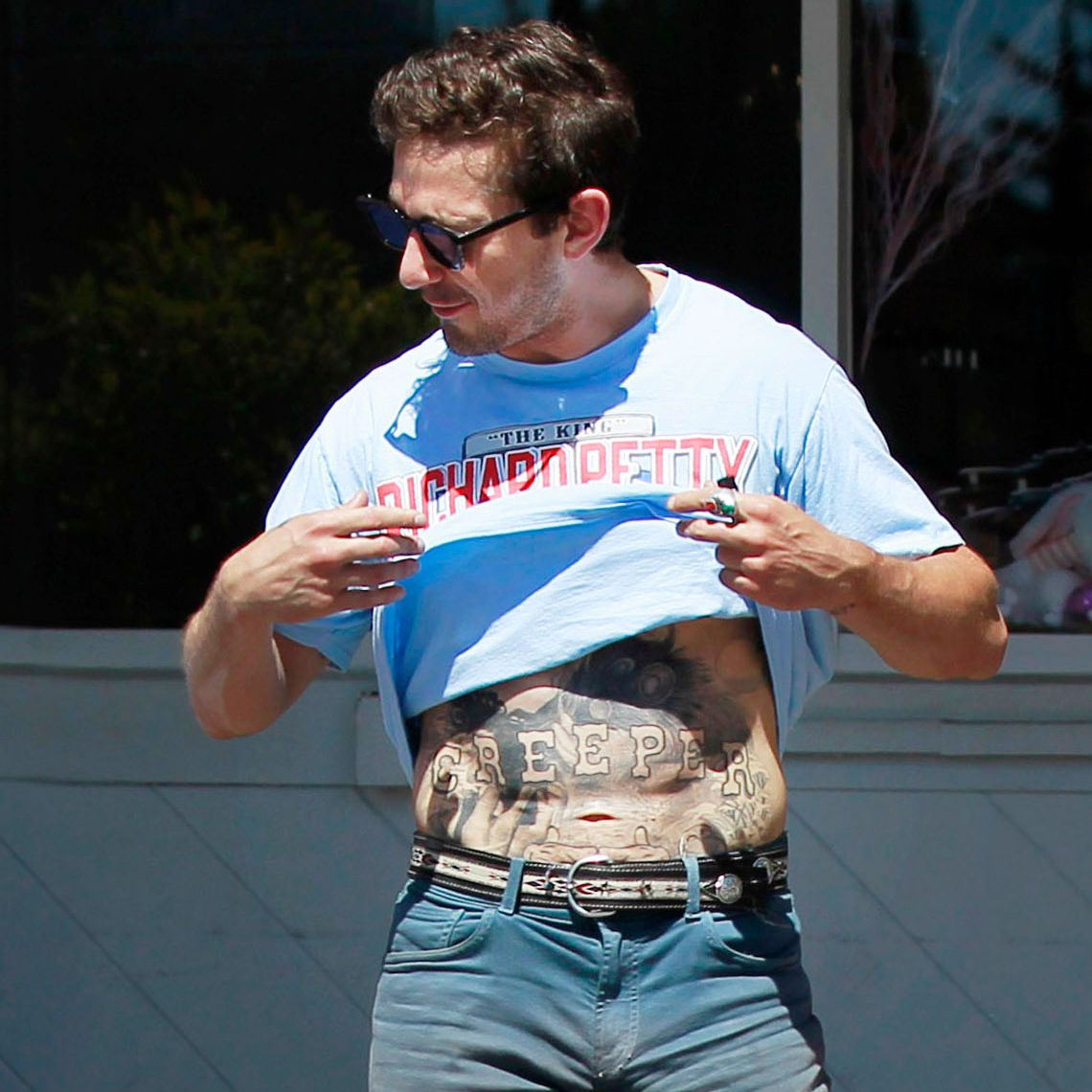 Shia LaBeouf's Tattoo Says 'CREEPER' Across His Stomach and It's Perfect