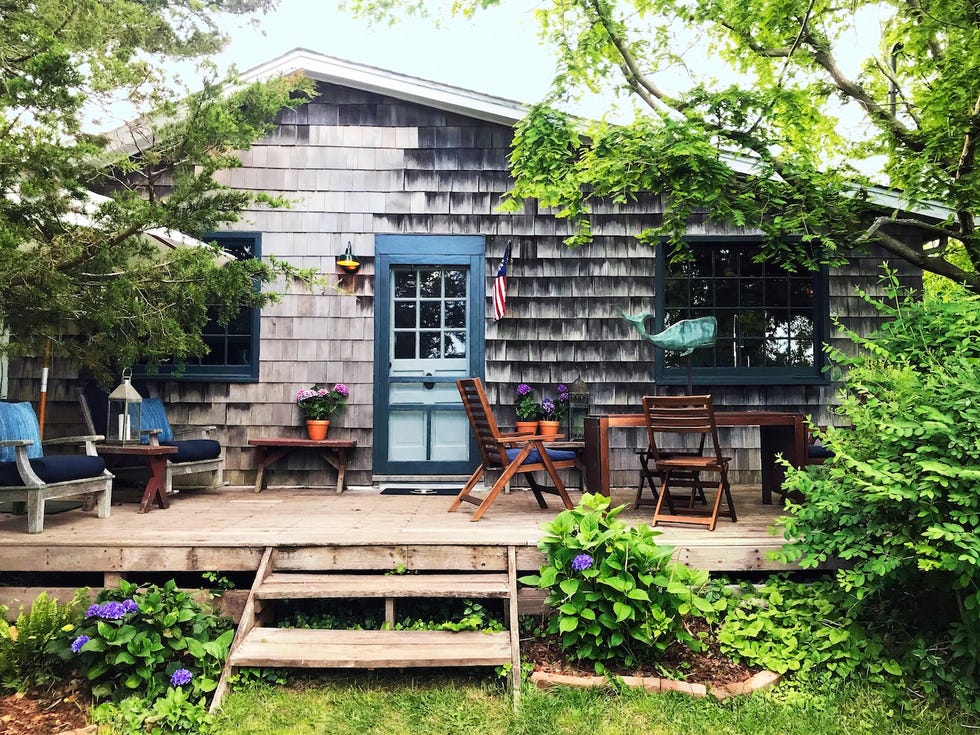 shingled beach cottage with blue door