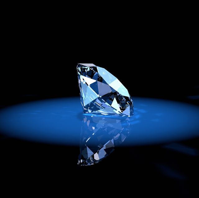shiny diamond gem in a blue spotlight