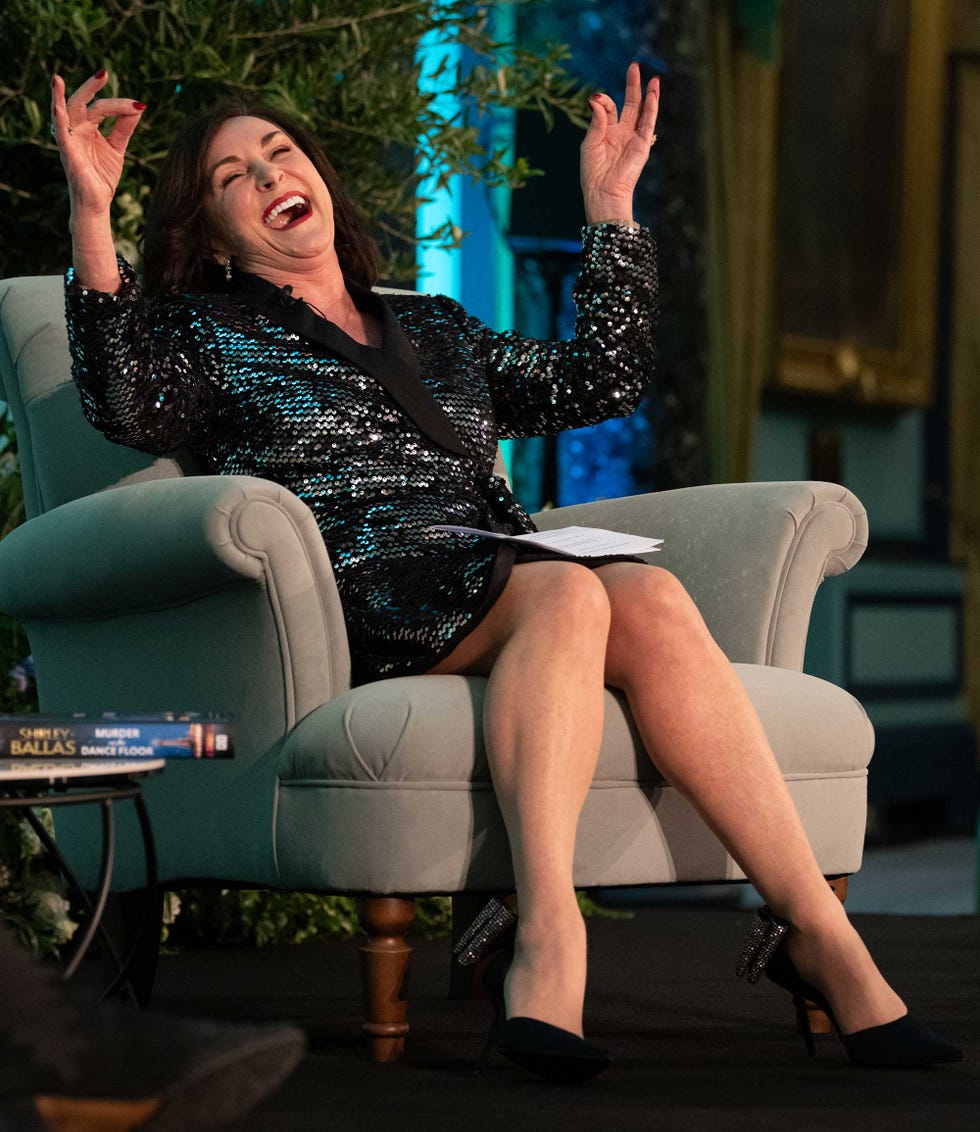 a woman sitting on a chair