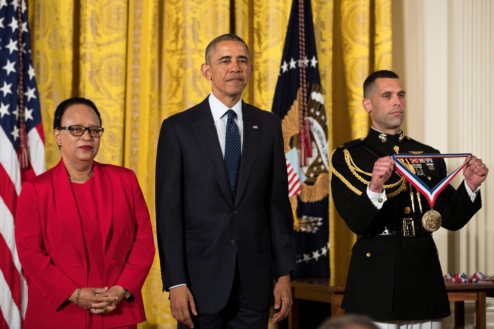 dr shirley jackson stands with president barack obama before receiving the national medal of science