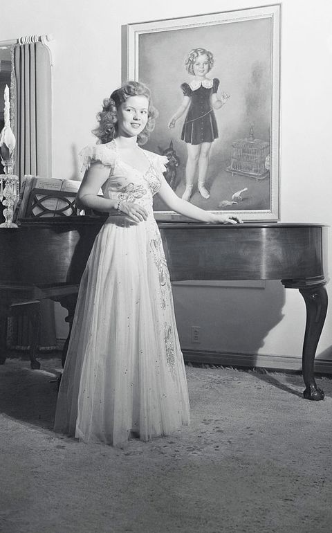 shirley temple modeling dress by piano