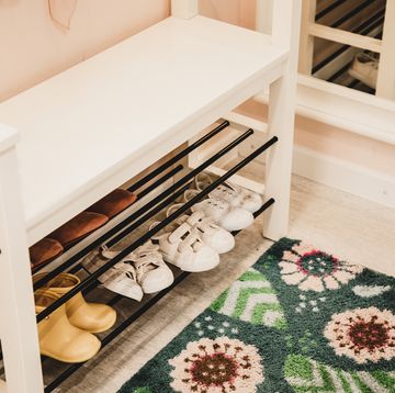 shoe rack with different size shoes showing the concept of family