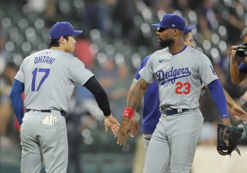 shohei ohtani 17 of the los angeles dodgers and jason heyward 23 of the los angeles dodgers celebrate after defeating the chicago white sox on june 24, 2024