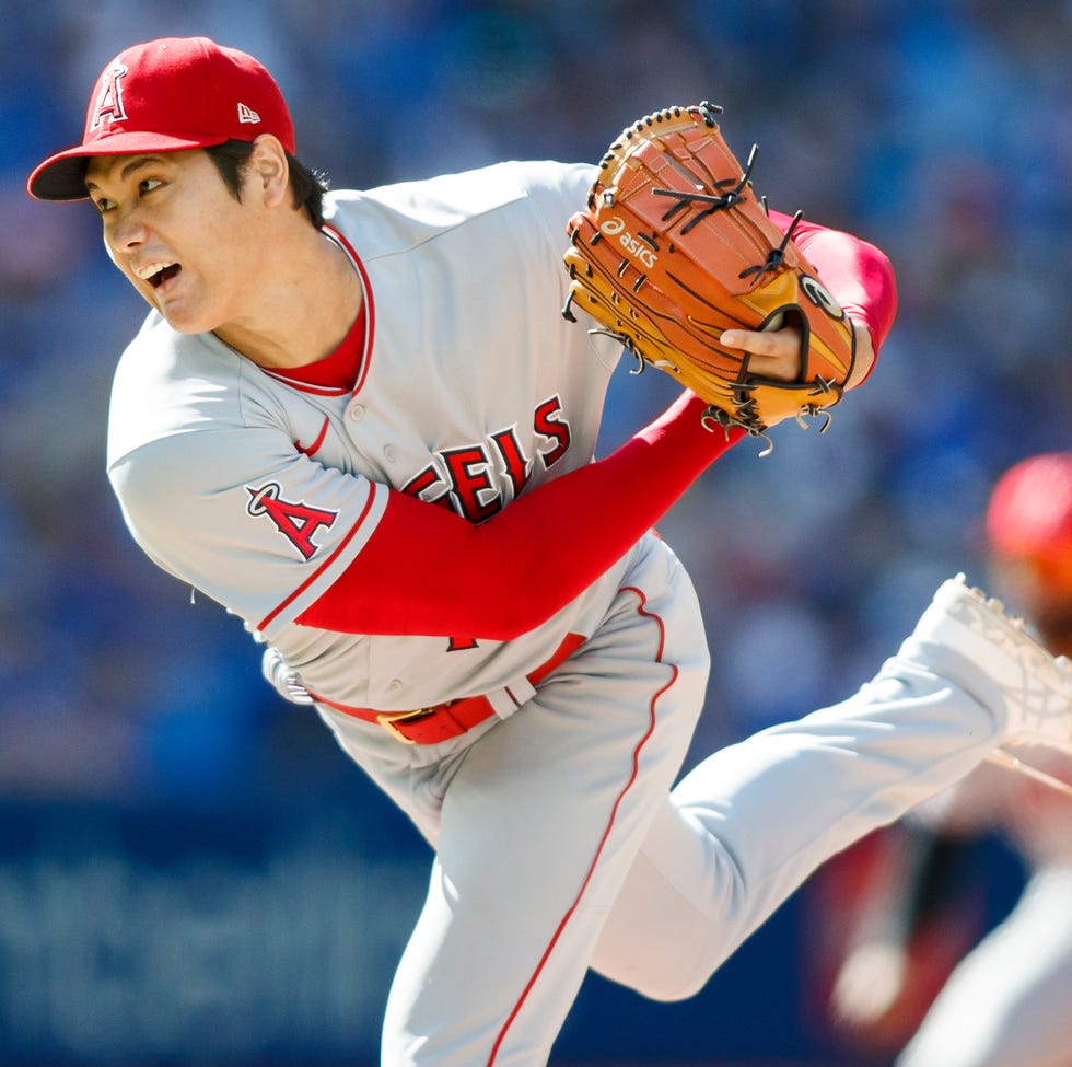 shohei ohtani on his followthrough for a pitch