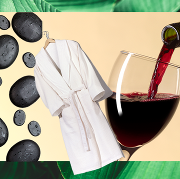 hot stones white bathrobe red wine