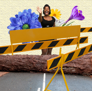 woman in middle of the road yellow stop signs flowers