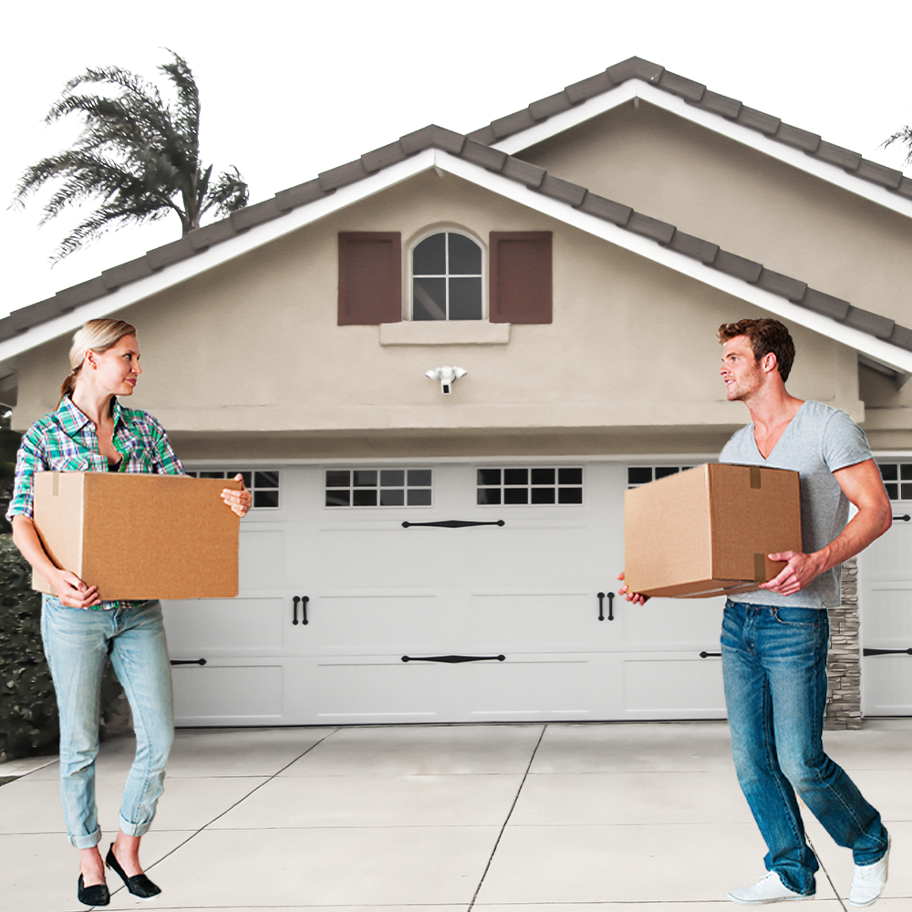 man and woman moving into house together
