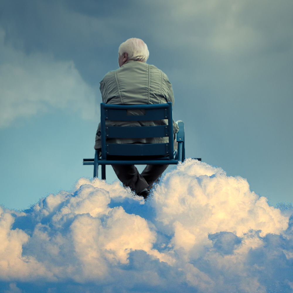 older man in wheelchair on top of clouds