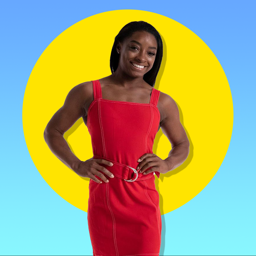 simone biles in front of yellow circle over blue background