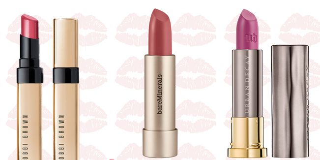 multiple nude, red, and pink lipsticks on a background