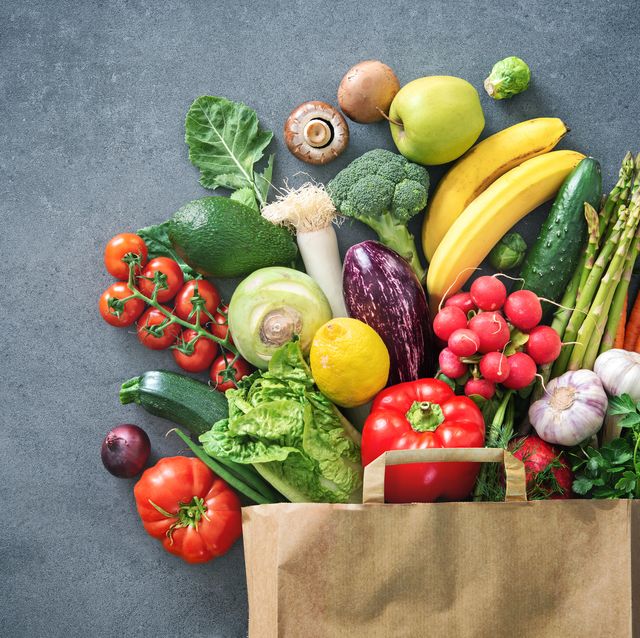 shopping bag full of fresh vegetables and fruits