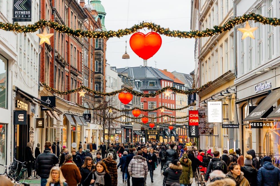 shopping street in historical center of copenhagen decorated for christmas holidays, denmark