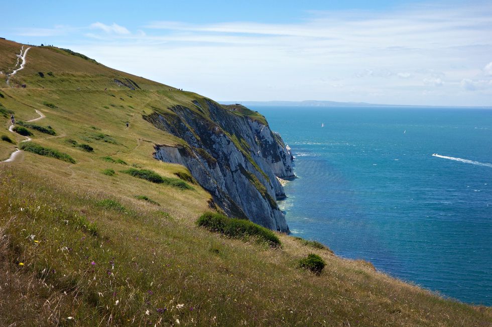 shoreline of the needles headland and tennyson down, england